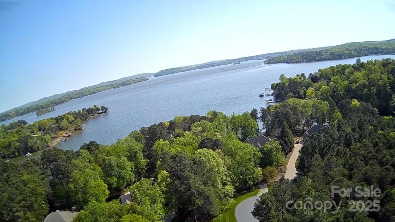 133 Baden View Road Badin Lake, NC 28127 - Photo 32 of 48 an aerial view of a house with a yard and garden in back