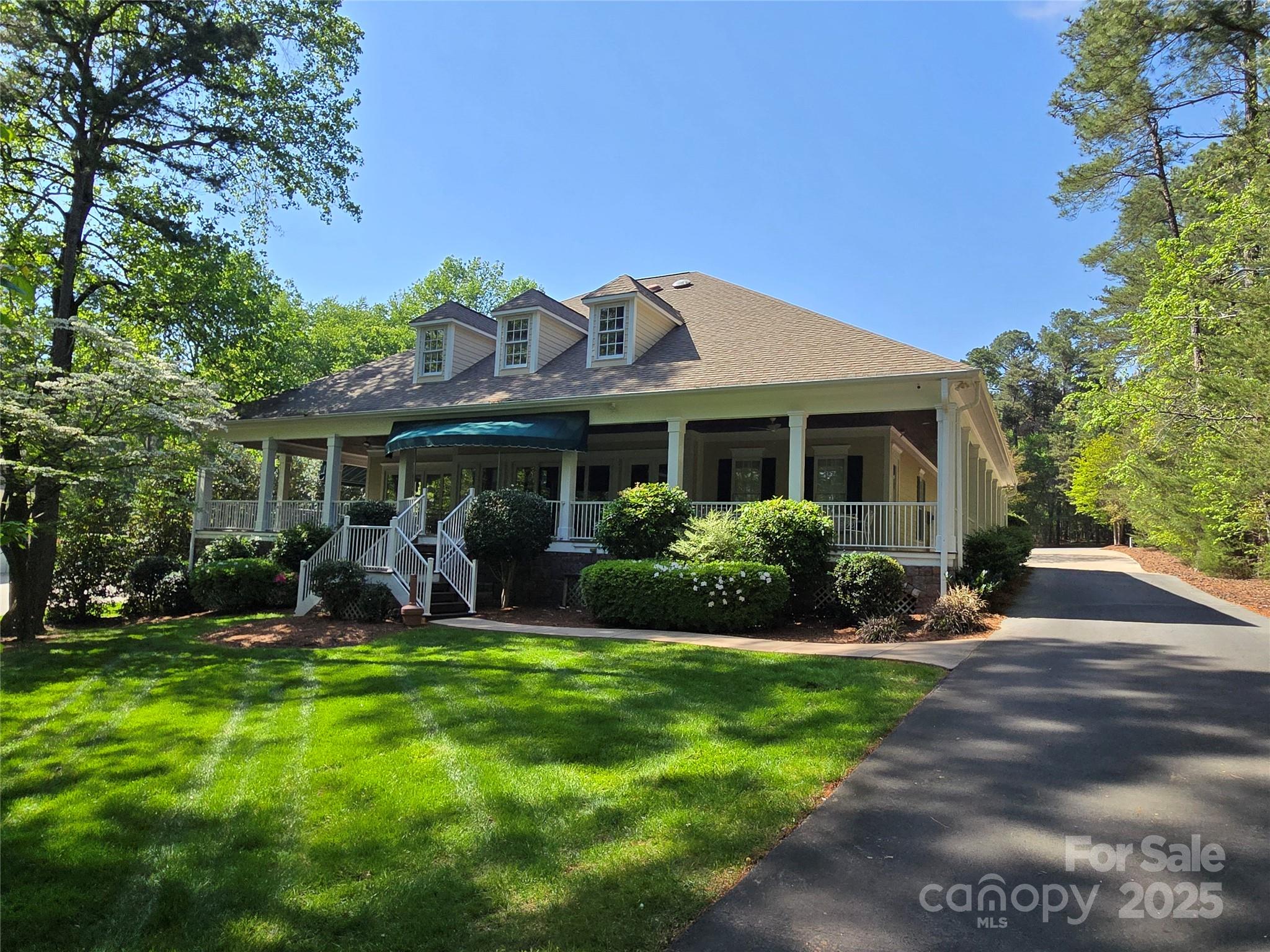 133 Baden View Road Badin Lake, NC 28127 - Photo 40 of 48 a front view of a house with yard and green space
