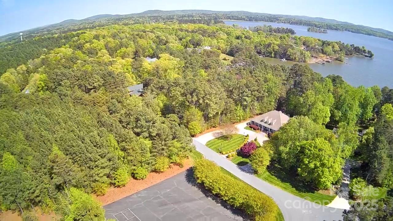 133 Baden View Road Badin Lake, NC 28127 - Photo 8 of 48 a view of a garden with an outdoor space