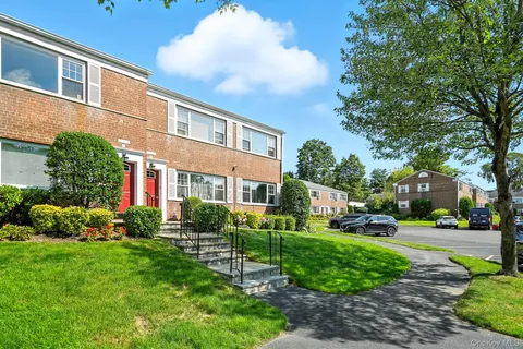 a view of a building with a garden