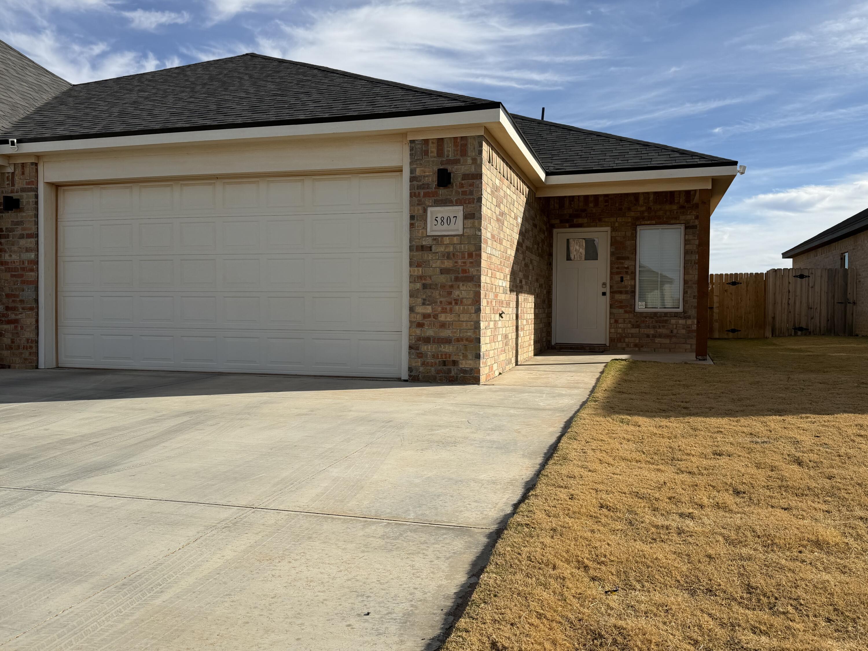 5807 Virginia Avenue Lubbock, TX 79407 - Photo 1 of 26 a front view of a house