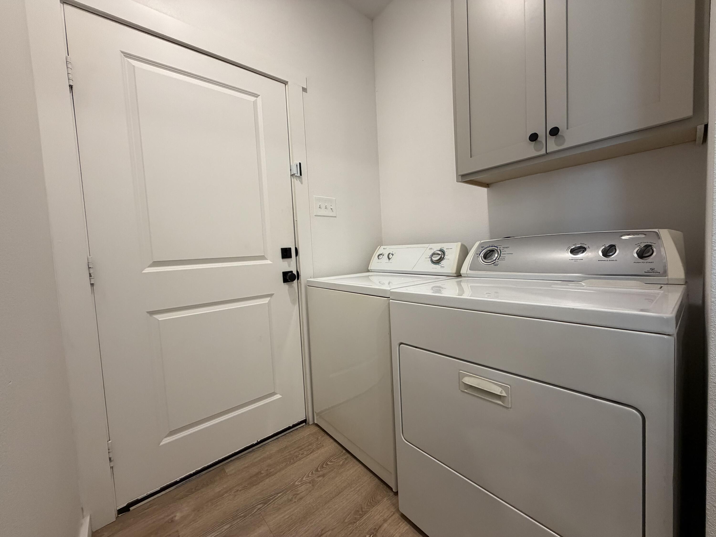 5807 Virginia Avenue Lubbock, TX 79407 - Photo 13 of 26 a utility room with dryer and washer
