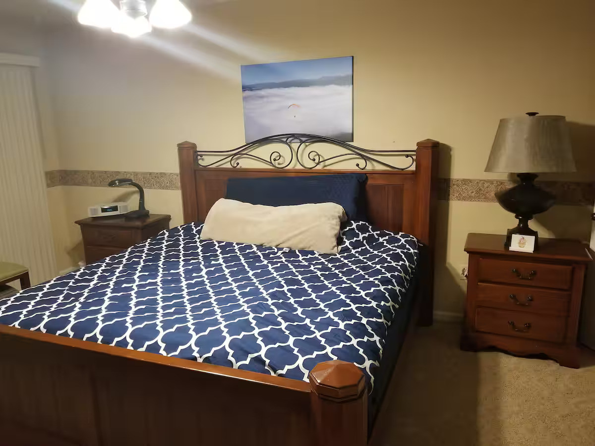 4 Forest Knolls Decatur, IL 62521 - Photo 12 of 32 a bedroom with a bed and dresser