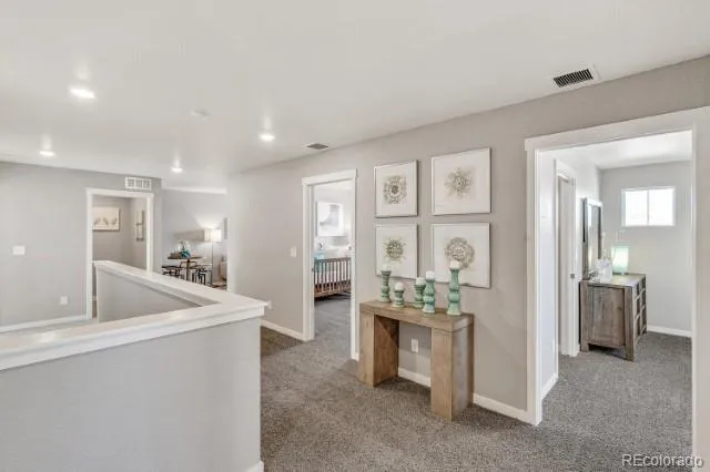 a view of a kitchen counter space and windows