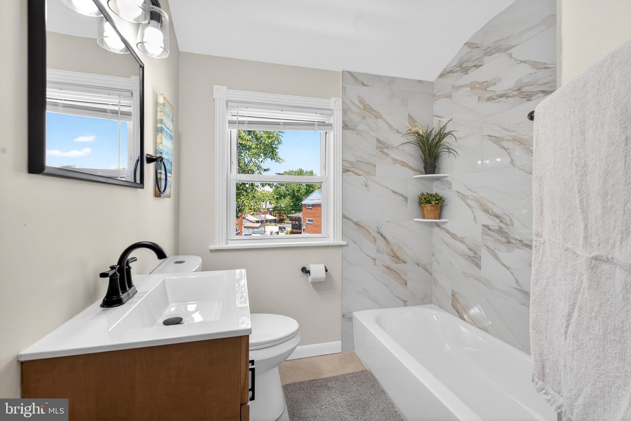 2115 Pitney Road Baltimore, MD 21234 - Photo 14 of 29 Renovated full bathroom upstairs