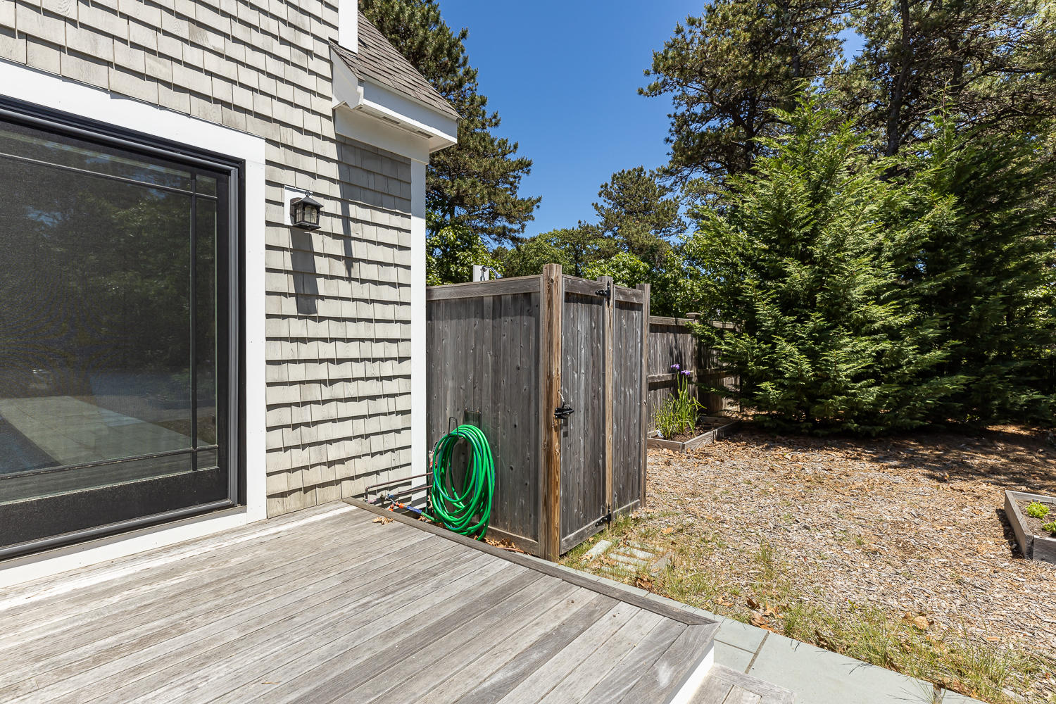 1 Yellow Brick Road Truro, MA 02666 - Photo 9 of 34 a view of backyard with potted plants