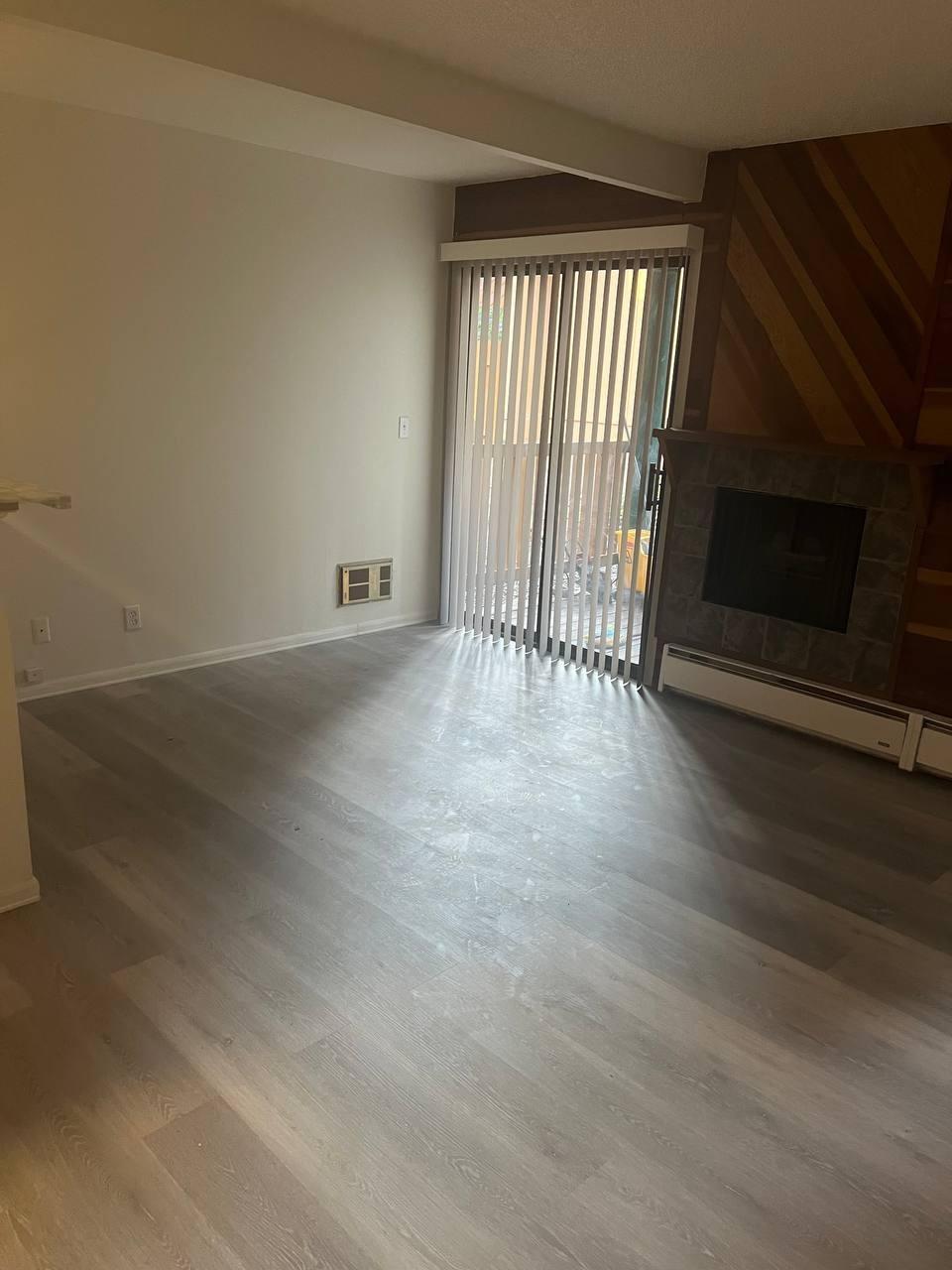 1300 Regency Way, Unit 44 Tahoe Vista, CA 96148 - Photo 18 of 25 a view of an empty room with wooden floor and a window