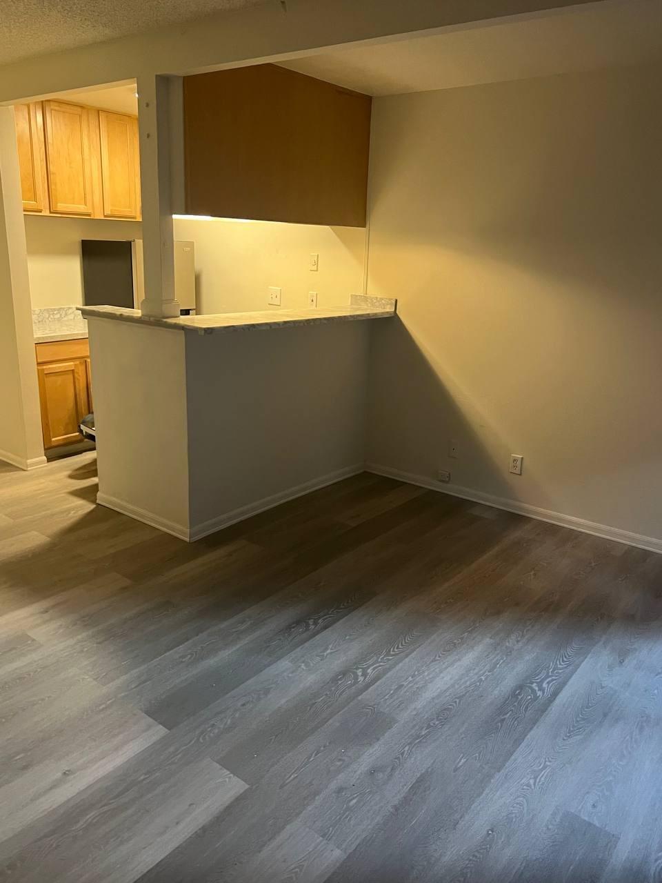 1300 Regency Way, Unit 44 Tahoe Vista, CA 96148 - Photo 2 of 25 a view of a kitchen with wooden floor and a sink