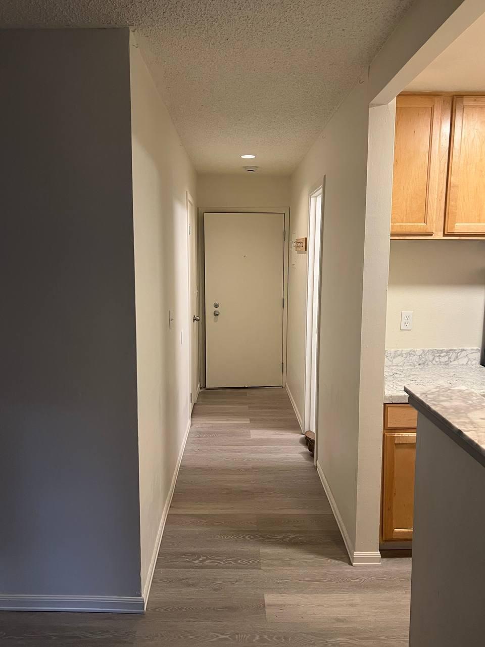 1300 Regency Way, Unit 44 Tahoe Vista, CA 96148 - Photo 7 of 25 a view of a hallway with wooden floor and staircase
