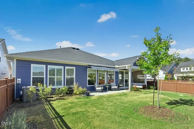 a backyard of a house with lots of green space