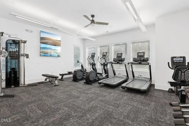 a view of a table and chairs in the garden