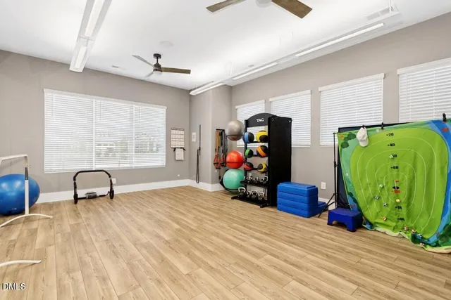 a view of a lake with houses in the back