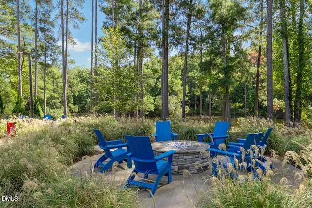 a view of a street in front of a house
