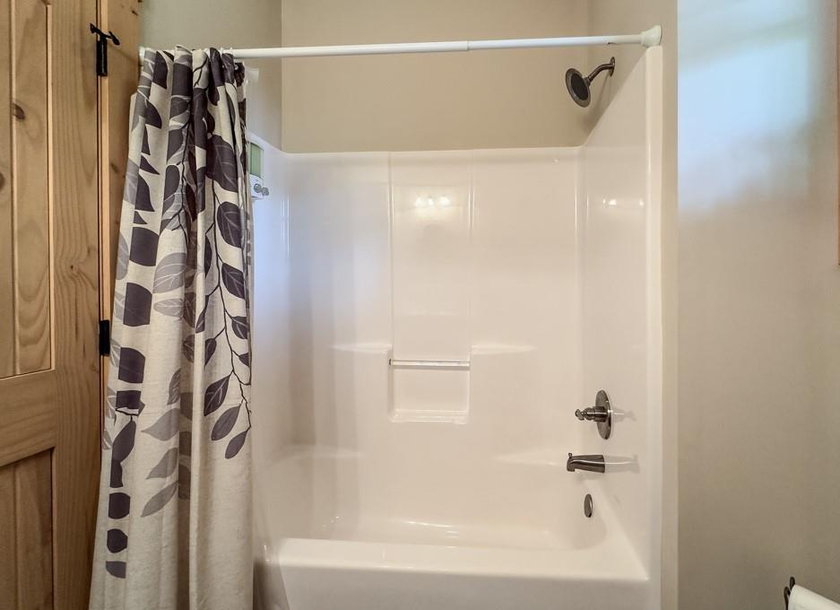 111 Watkins Farm Road Blue Ridge, GA 30513 - Photo 23 of 23 a bathroom with a shower and a shower