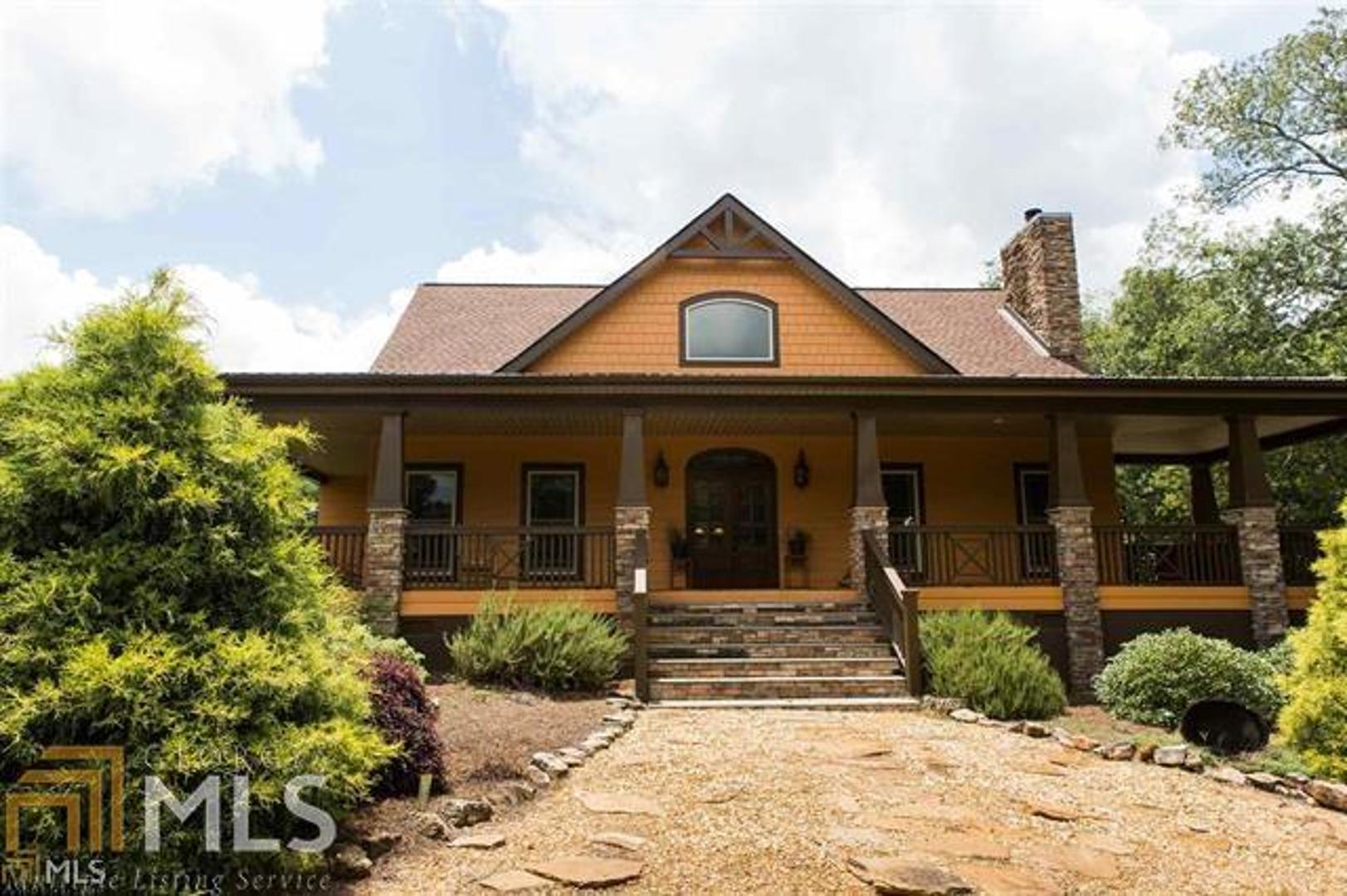 1185 Lawrence Road Molena, GA 30258 - Photo 1 of 1 a front view of a house with garden