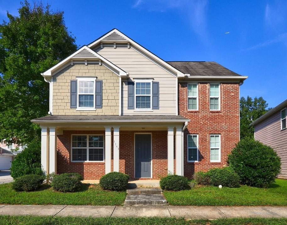 7543 Waverly Loop Fairburn, GA 30213 - Photo 1 of 1 a front view of a house with a yard