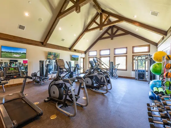 a view of a room with gym equipment