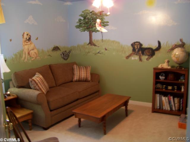 15219 Windy Ridge Road Midlothian, VA 23112 - Photo 11 of 12 a living room with furniture and wooden floor