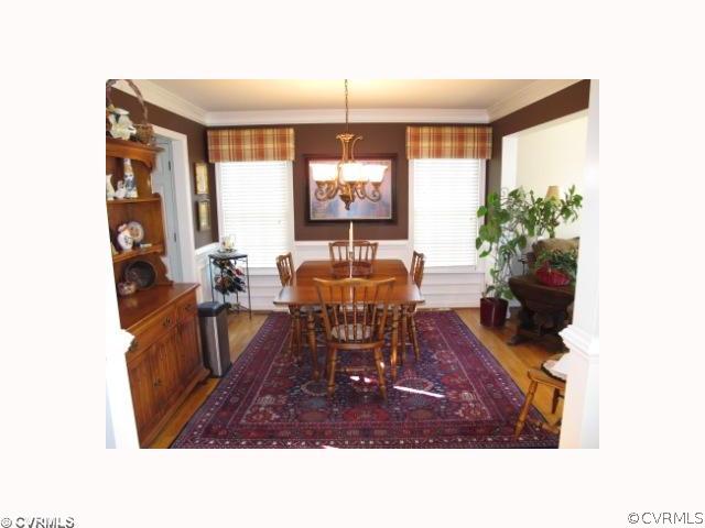 15219 Windy Ridge Road Midlothian, VA 23112 - Photo 6 of 12 a living room with furniture and a large window