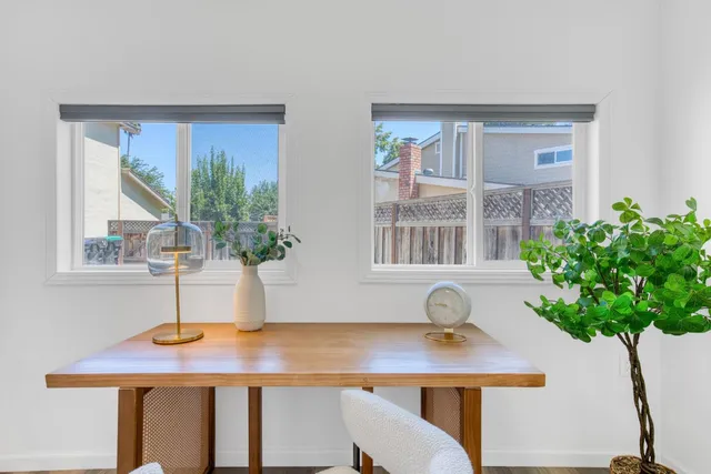 a dining room with table and chair