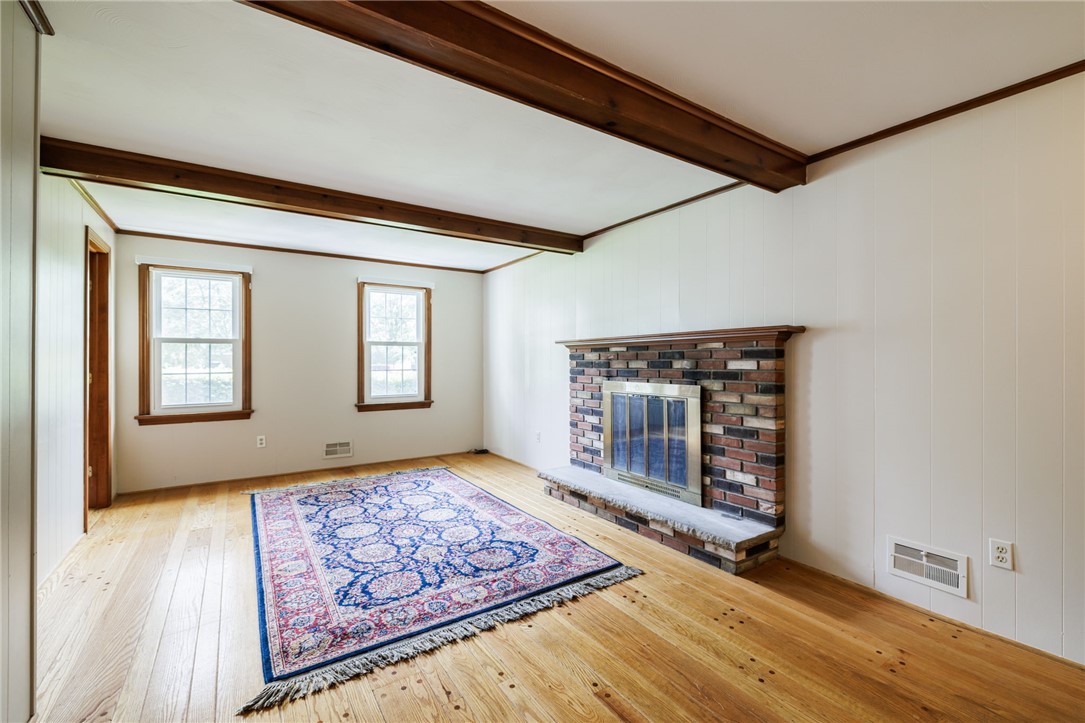 37 Heatherwood Road Perinton, NY 14450 - Photo 9 of 42 Cozy family room with wood burning fireplace