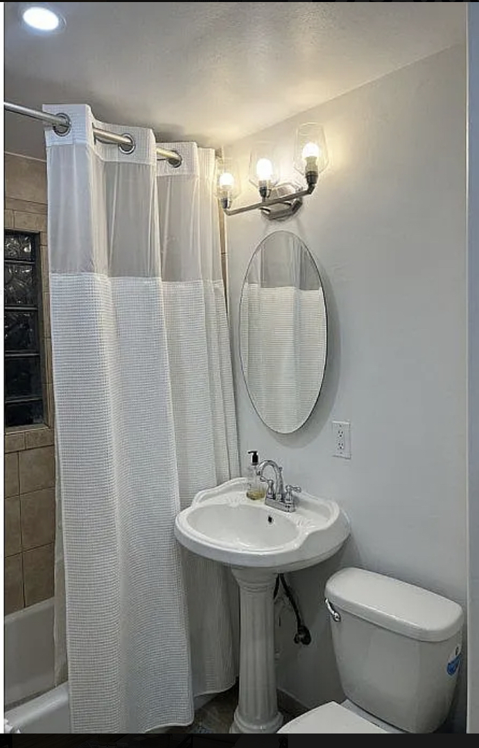 31 Krotiak Road Park Forest, IL 60466 - Photo 14 of 15 a bathroom with a sink toilet and mirror