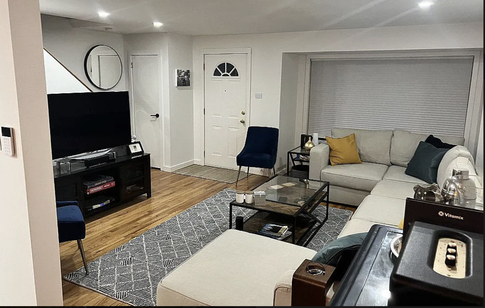 31 Krotiak Road Park Forest, IL 60466 - Photo 4 of 15 a living room with furniture a flat screen tv and a fireplace