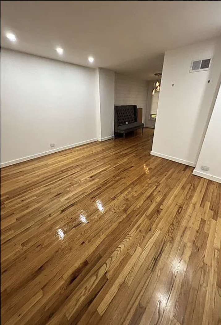 31 Krotiak Road Park Forest, IL 60466 - Photo 6 of 15 an empty room with wooden floor and a sink