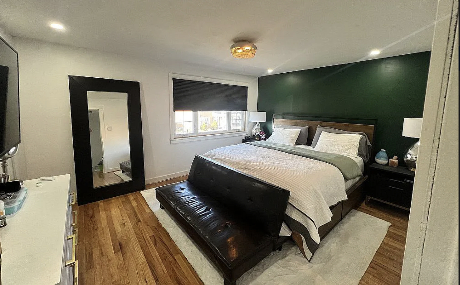 31 Krotiak Road Park Forest, IL 60466 - Photo 10 of 15 a bedroom with a bed and a flat screen tv