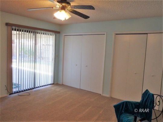 537 North Rio Bravo Street Ridgecrest, CA 93555 - Photo 13 of 35 a view of livingroom with furniture and chandelier fan