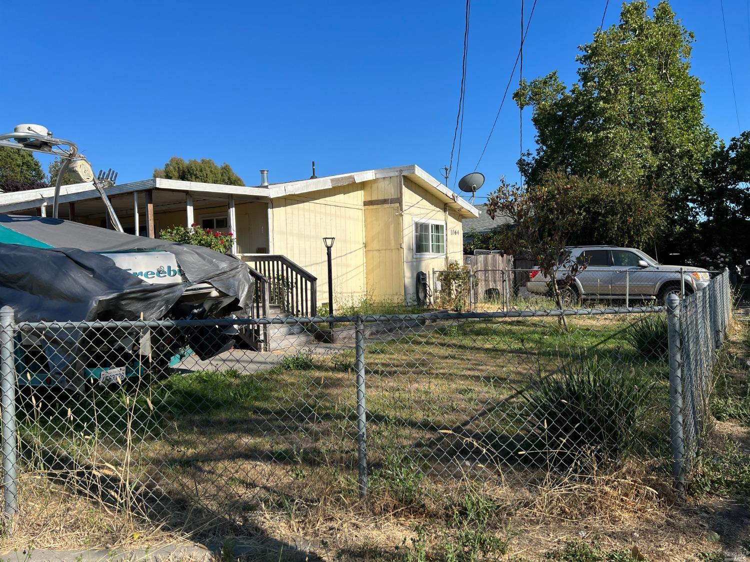 1064 South Wright Road Santa Rosa, CA 95407 - Photo 1 of 1 a front view of a house with garden