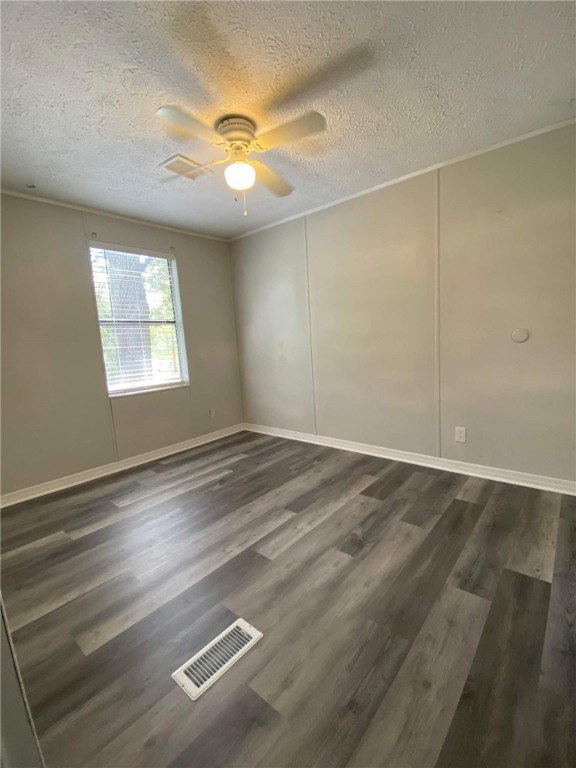 96142 Lang Road Yulee, FL 32097 - Photo 8 of 15 wooden floor in an empty room with a window