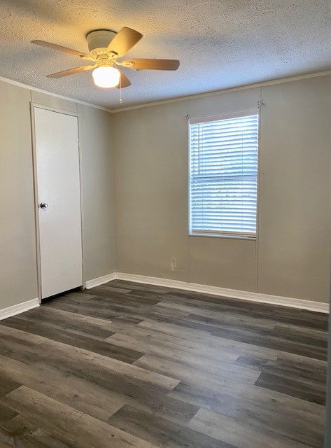 96142 Lang Road Yulee, FL 32097 - Photo 9 of 15 a view of an empty room with window and wooden floor