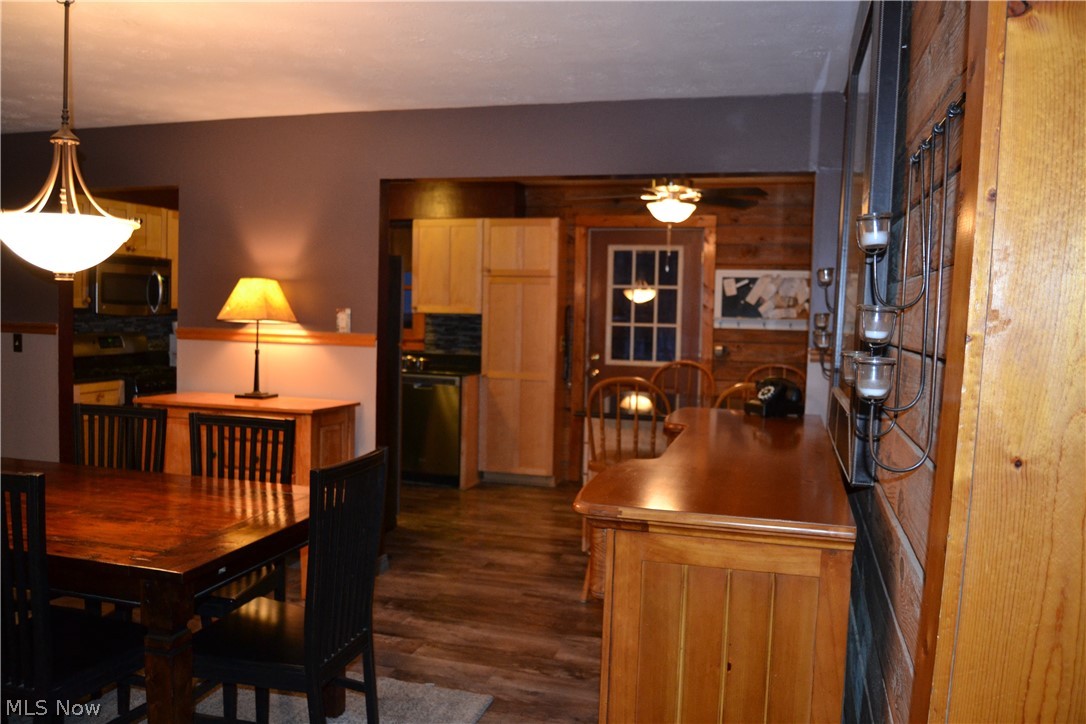 4864 Phillips Rice Road Cortland, OH 44410 - Photo 15 of 35 A separate dining room allows for formal entertaining and provides easy access to the open kitchen.