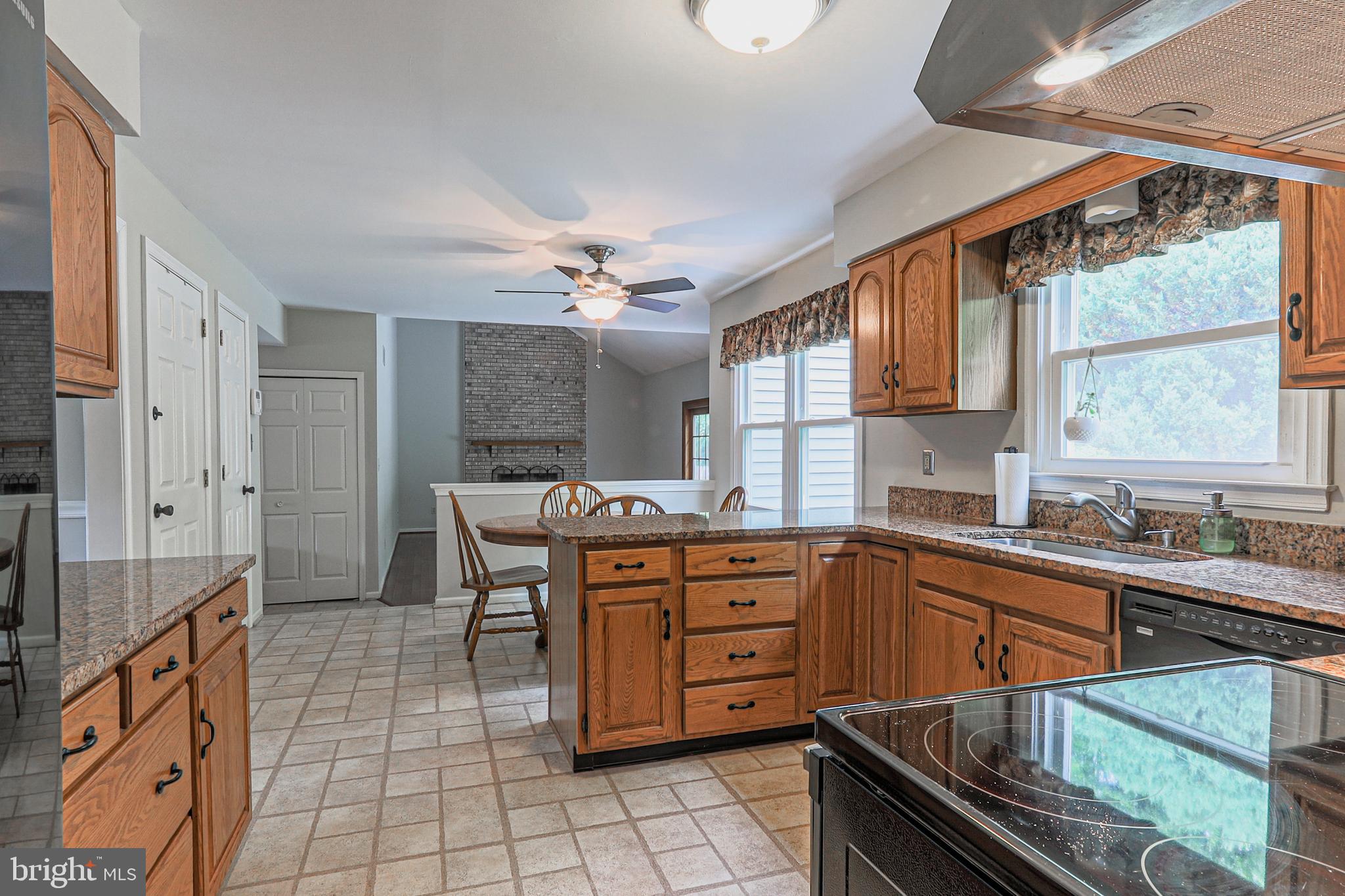 138 Woodland Road Newark, DE 19702 - Photo 7 of 29 Kitchen opens into breakfast area and family room