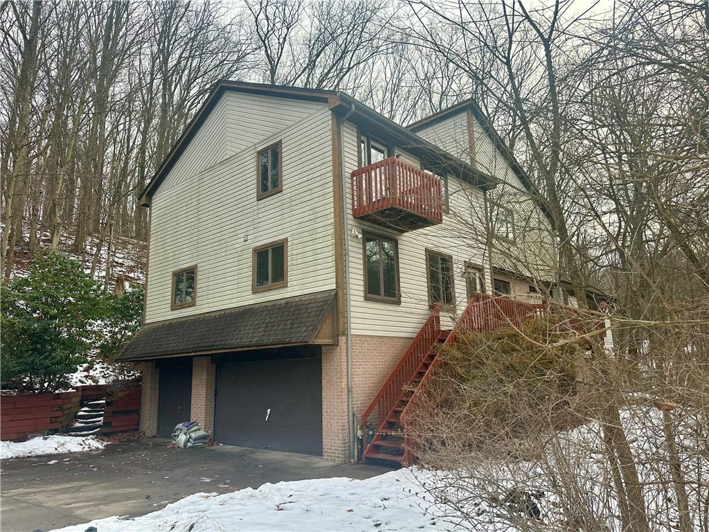 513 Sandra Lane Cheswick, PA 15024 - Photo 1 of 49 a front view of a house with a yard