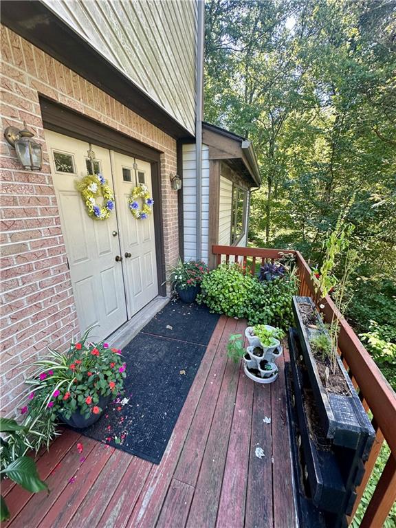 513 Sandra Lane Cheswick, PA 15024 - Photo 11 of 48 a view of house with wooden floor and potted plant