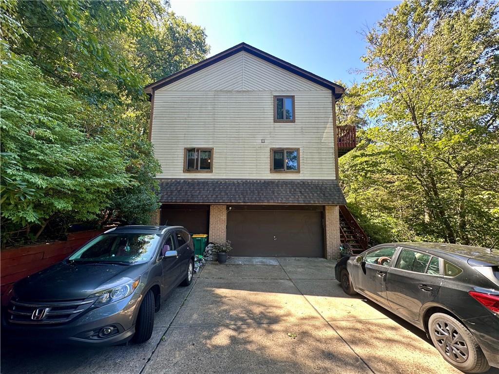513 Sandra Lane Cheswick, PA 15024 - Photo 2 of 48 a view of a car parked in front of a house