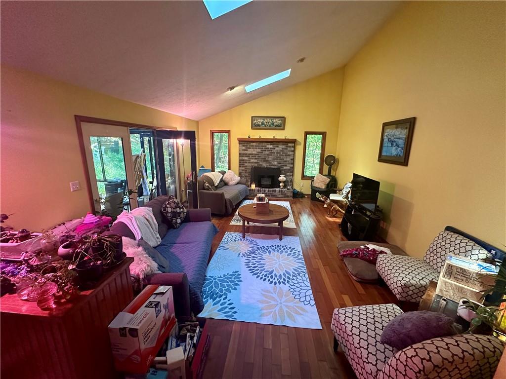 513 Sandra Lane Cheswick, PA 15024 - Photo 22 of 48 a living room with furniture fireplace and a large window