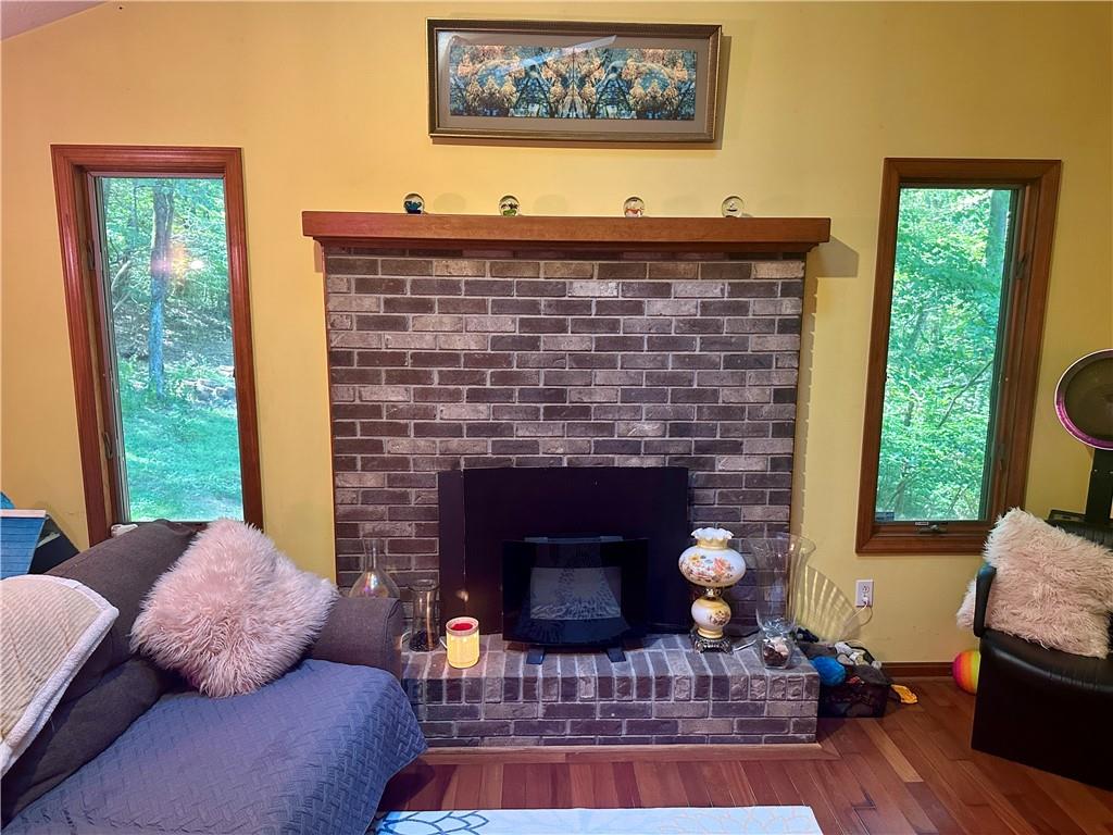 513 Sandra Lane Cheswick, PA 15024 - Photo 24 of 48 a living room with furniture and a fireplace