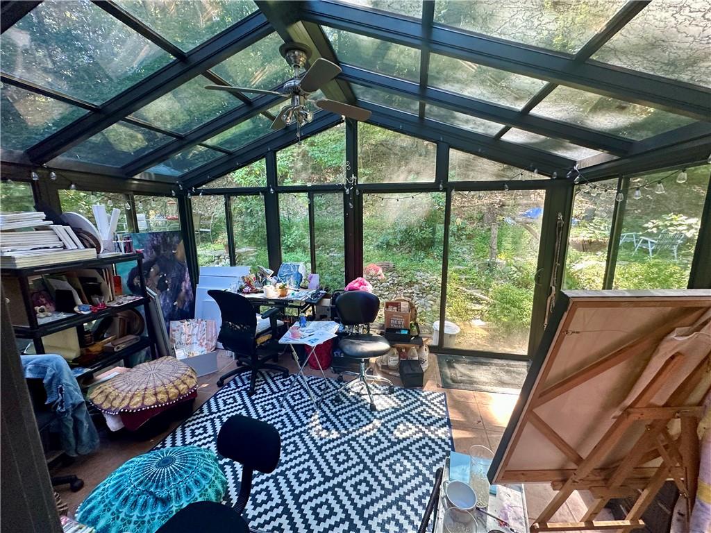 513 Sandra Lane Cheswick, PA 15024 - Photo 25 of 48 a living room with furniture and a floor to ceiling window
