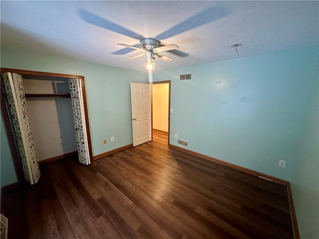 513 Sandra Lane Cheswick, PA 15024 - Photo 32 of 49 a view of an empty room with wooden floor and a window