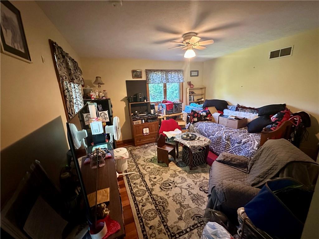 513 Sandra Lane Cheswick, PA 15024 - Photo 41 of 48 a living room with furniture a flat screen tv and a window