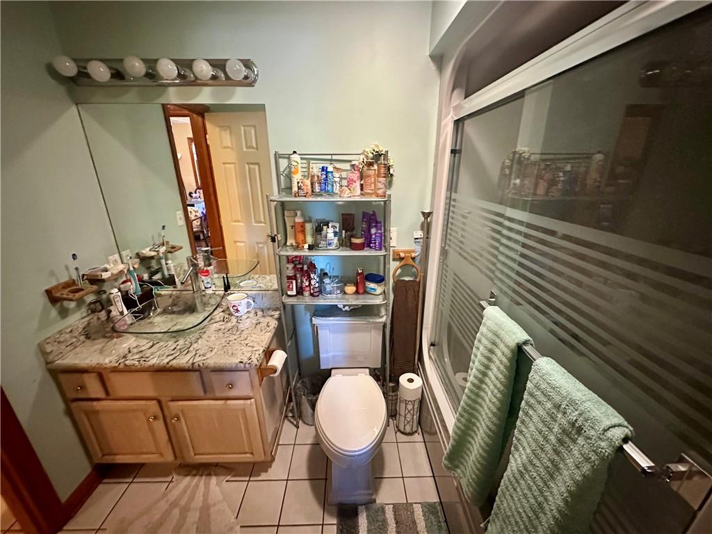 513 Sandra Lane Cheswick, PA 15024 - Photo 42 of 48 a bathroom with a sink mirror vanity and toilet