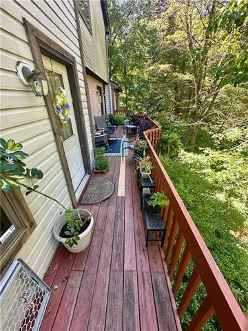 a view of deck with seating area
