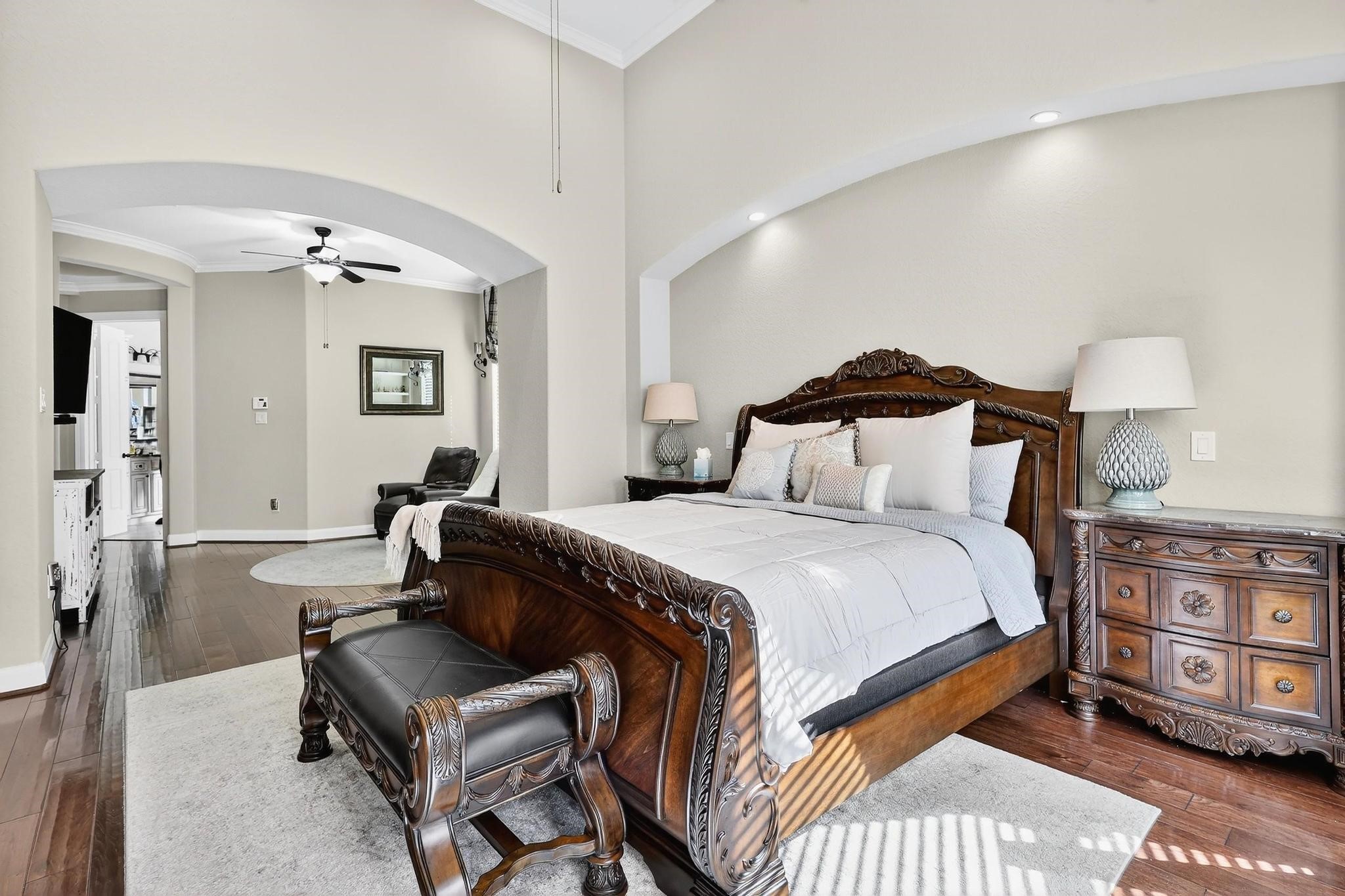 25803 Heritage Maple Drive Spring, TX 77389 - Photo 37 of 46 a bedroom with a bed and wooden floor