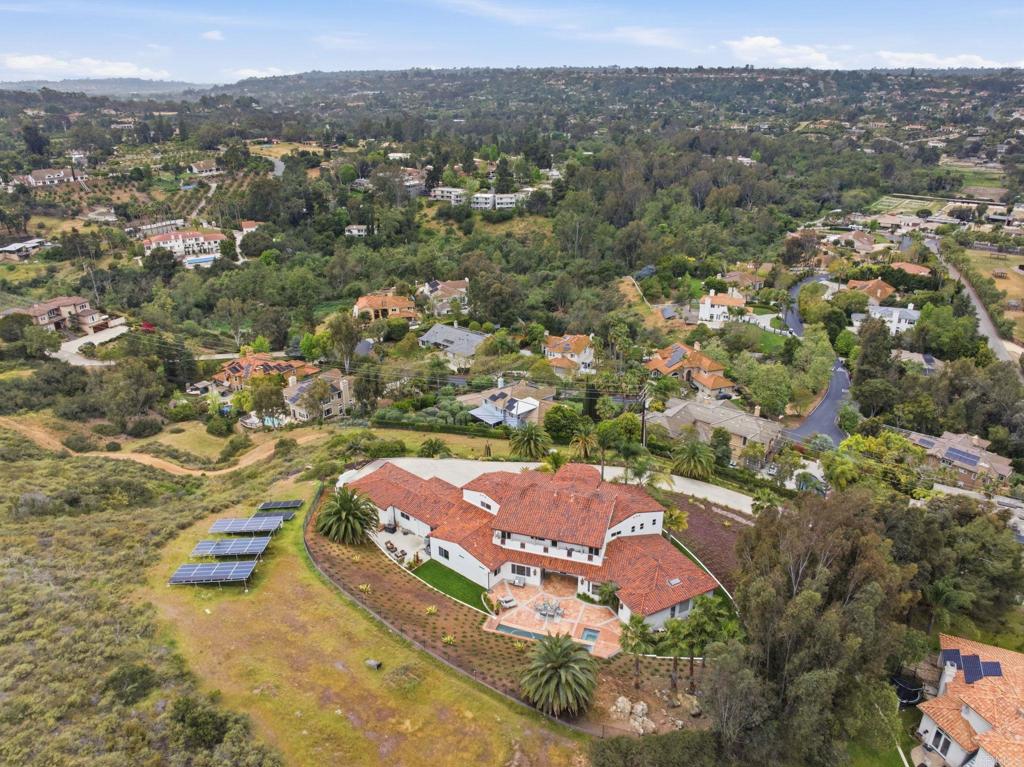3244 Olivenhain Farms Road Encinitas, CA 92024 - Photo 46 of 47 an aerial view of residential houses with outdoor space