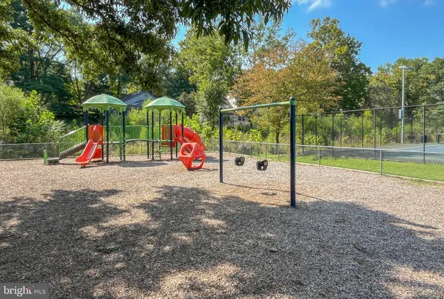 a view of park with swings