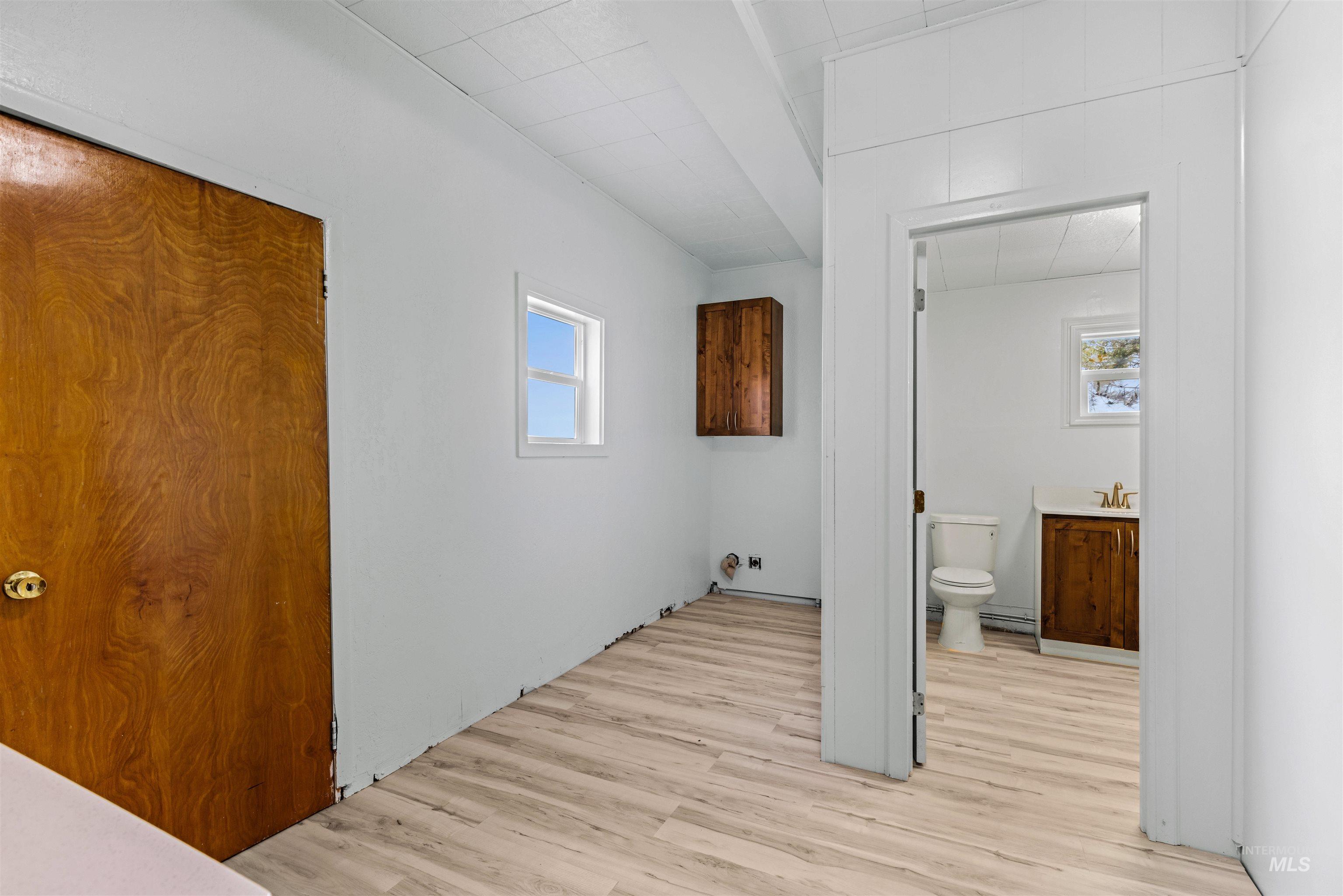 5168 South Jump Creek Road Marsing, ID 83639 - Photo 29 of 40 Laundry room featuring light wood-style floors