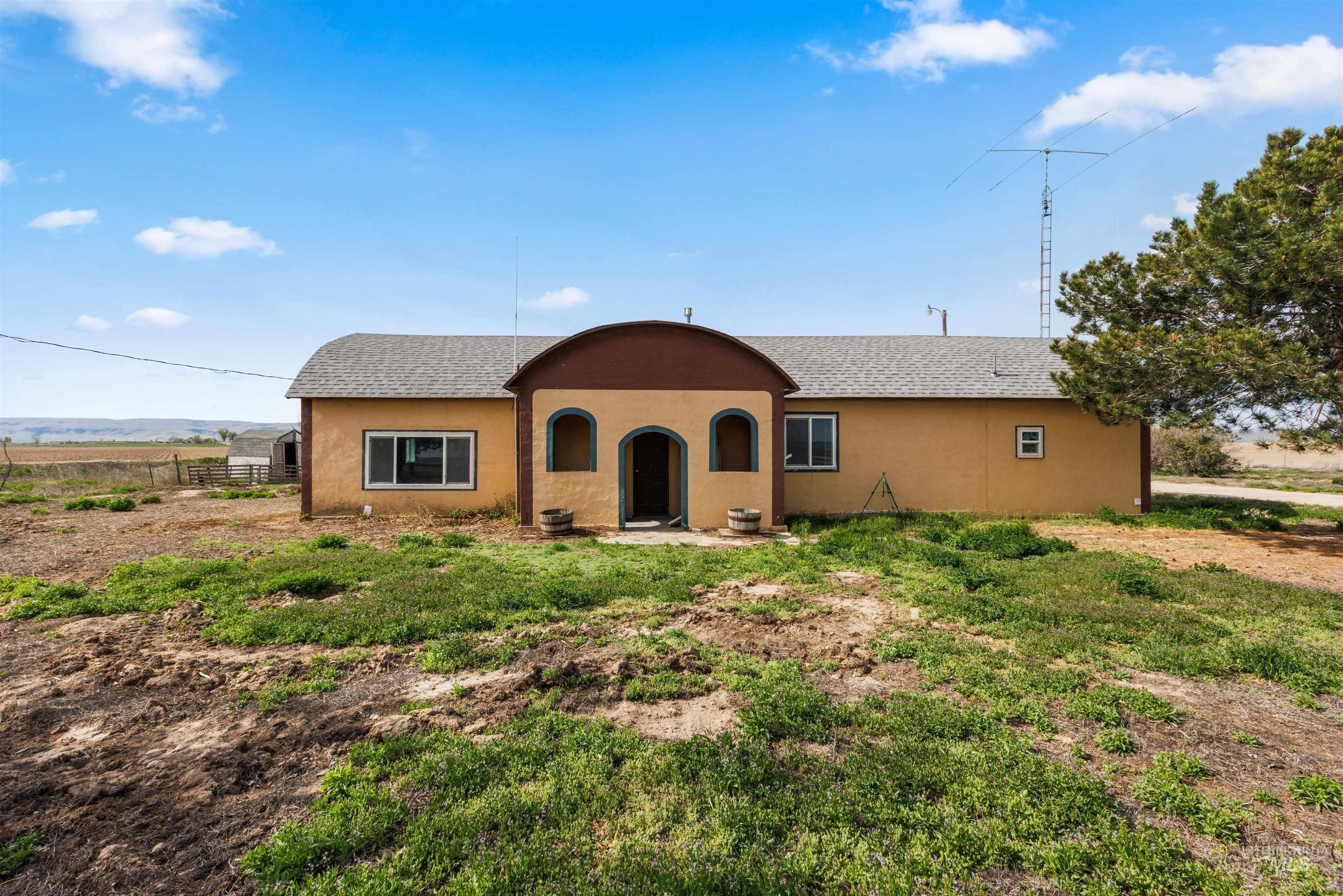 5168 South Jump Creek Road Marsing, ID 83639 - Photo 33 of 40 View of front of property with roof with shingles, stucco siding, and a patio area